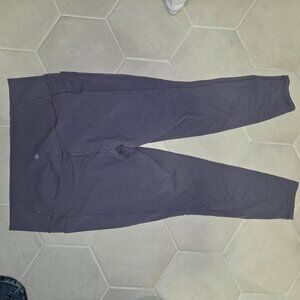 Athleta salutation stash pocket II 7/8 tight